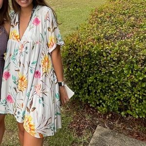 Flowy mini dress with ties in the back. Good condition, worn maybe 5 times.